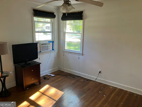 a workspace with furniture and window