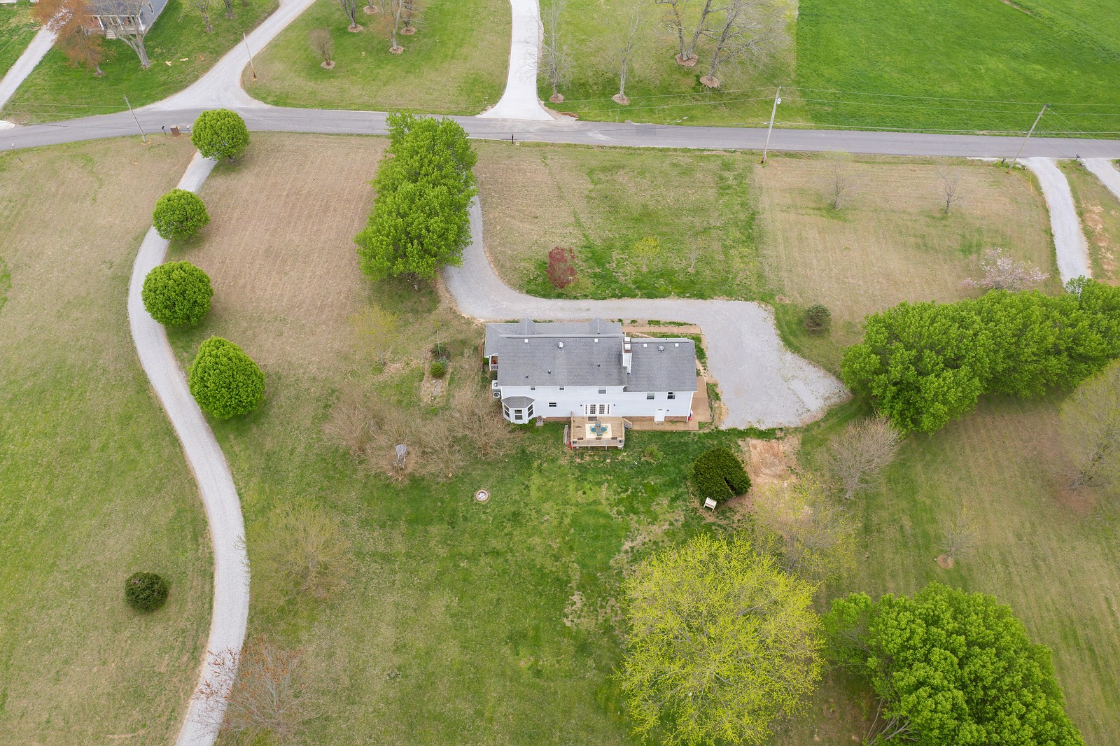2802 Woods Road Springfield, TN 37172 - Photo 6 of 33 an aerial view of a house with a yard lake swimming pool and outdoor space