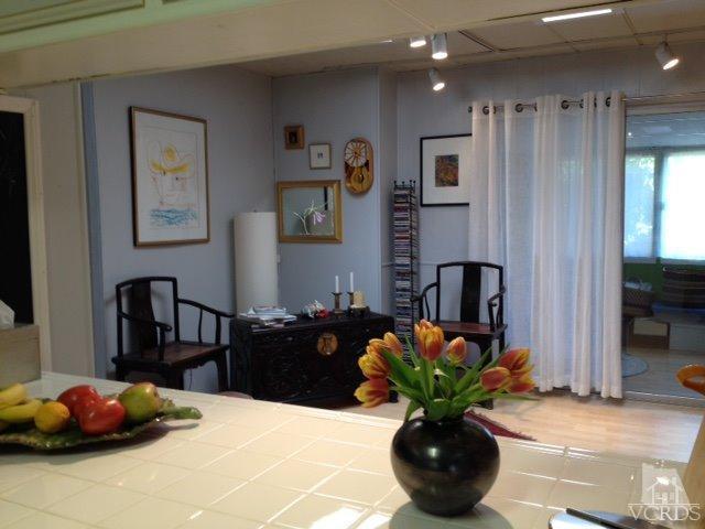 1225 South Rice Road, Unit 49 Ojai, CA 93023 - Photo 16 of 20 a vase of flowers sitting on a table