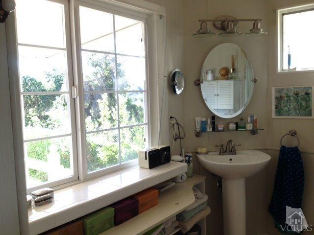 1225 South Rice Road, Unit 49 Ojai, CA 93023 - Photo 20 of 20 a bathroom with a sink and a mirror