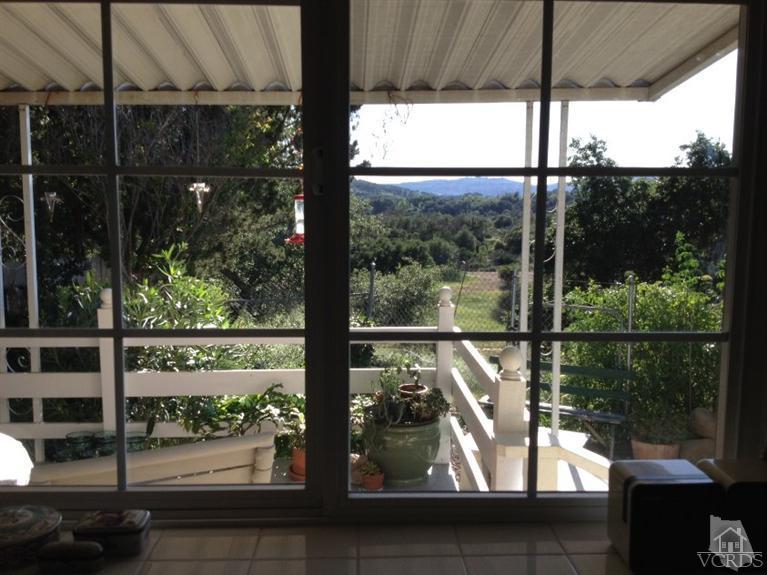 1225 South Rice Road, Unit 49 Ojai, CA 93023 - Photo 5 of 20 a view of a lake from a window