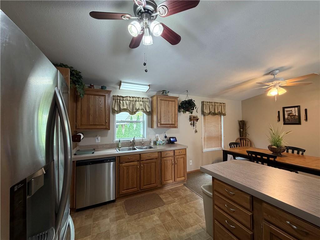 1881 Westford Road Jamestown, PA 16134 - Photo 20 of 50 a kitchen with stainless steel appliances a sink stove and refrigerator