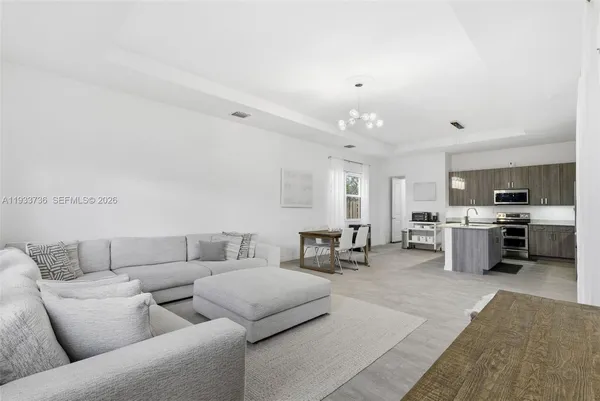 a bedroom with a bed and a table in it