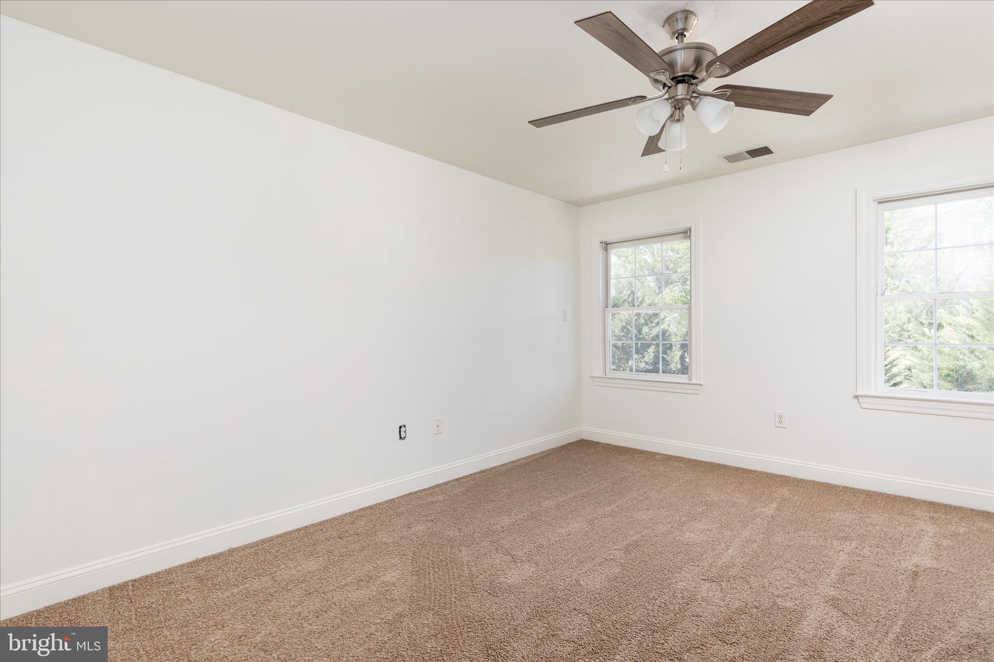 1200 Salem Church Road Stephens City, VA 22655 - Photo 16 of 69 an empty room with a window and a fan