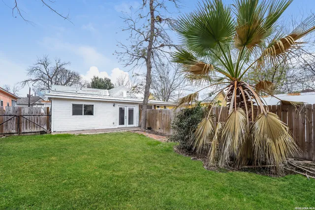 a view of a yard in front of a house