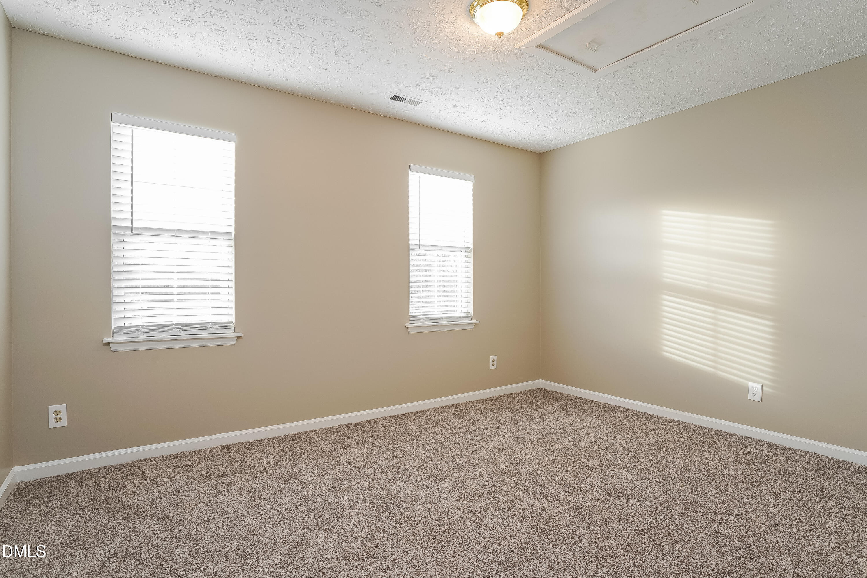 1132 Penselwood Drive Raleigh, NC 27604 - Photo 11 of 17 an empty room with windows