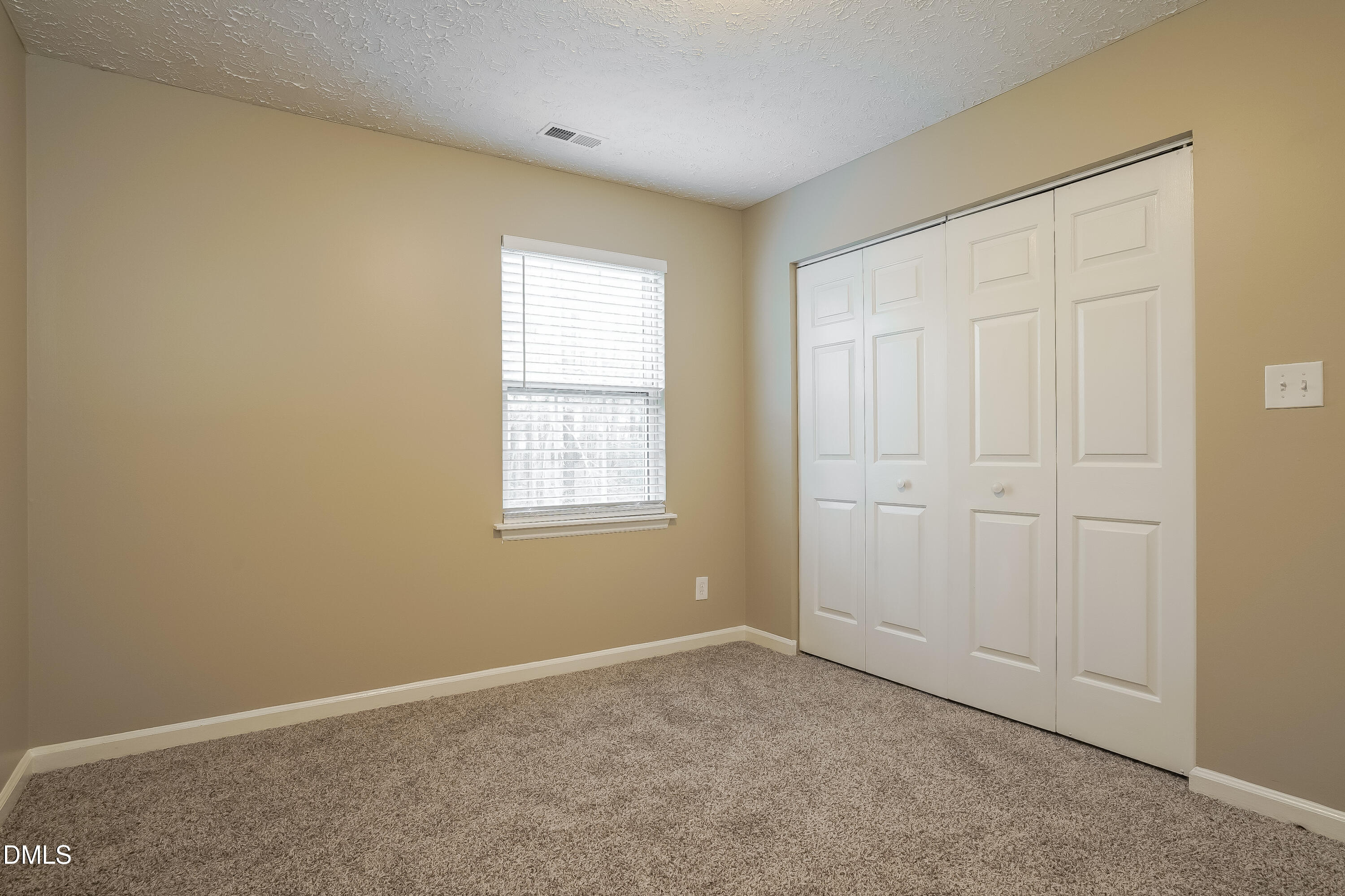 1132 Penselwood Drive Raleigh, NC 27604 - Photo 12 of 17 an empty room with windows