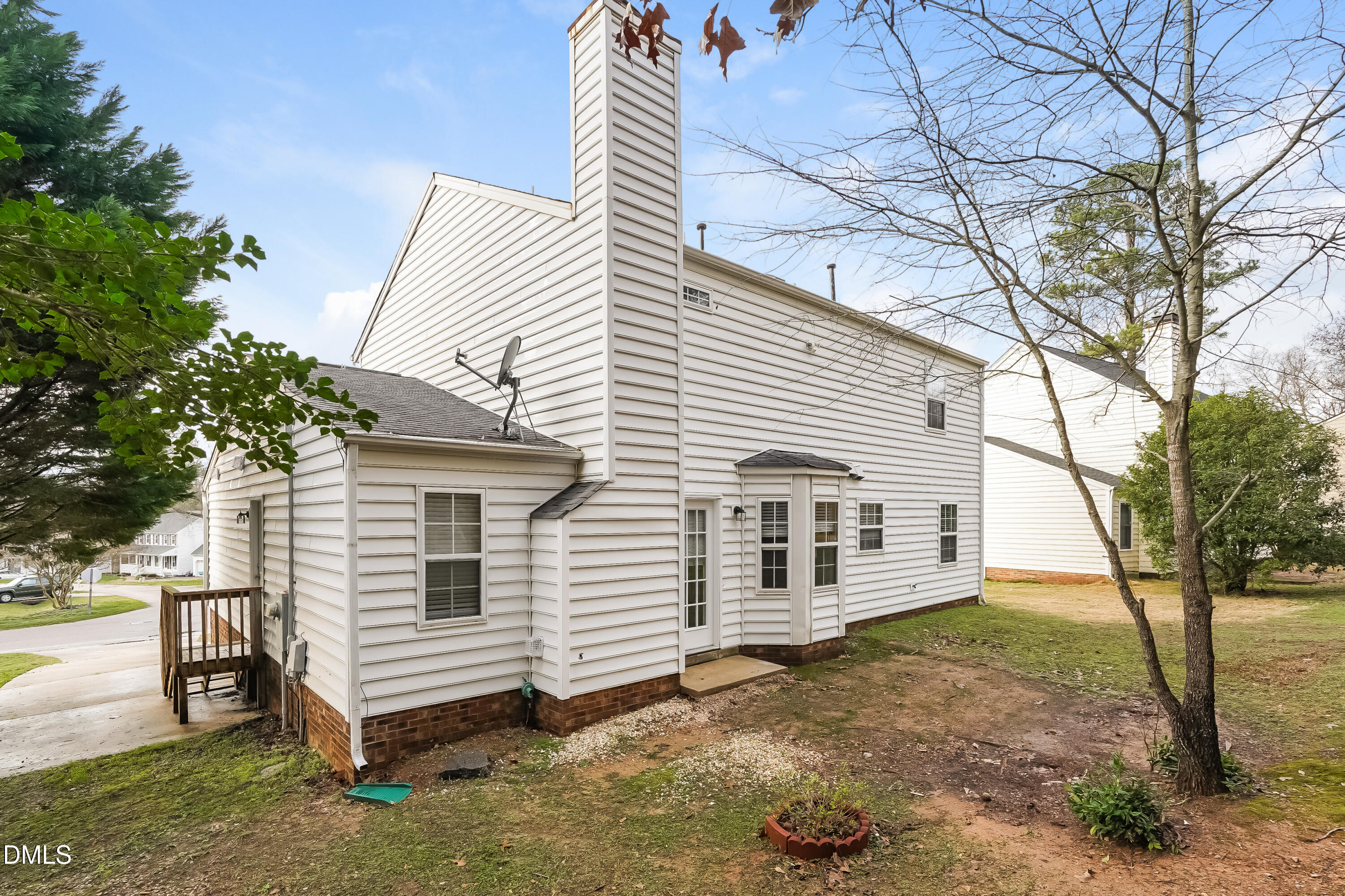 1132 Penselwood Drive Raleigh, NC 27604 - Photo 14 of 17 a view of a house with a yard