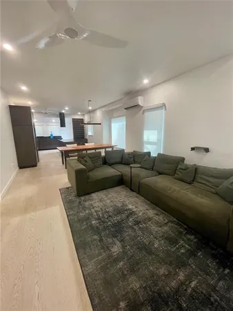 a living room with furniture and a couch