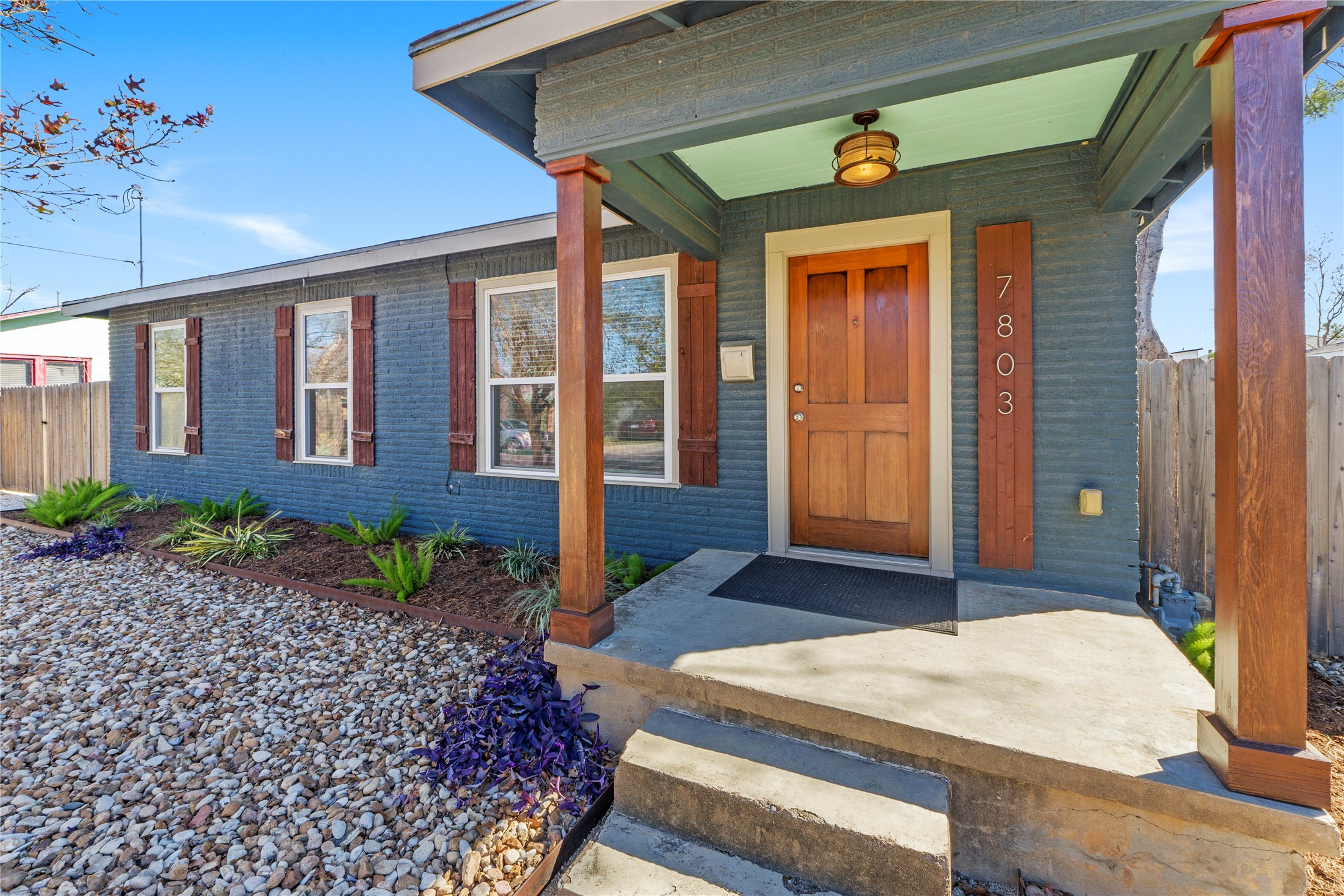 7803 Watson Street Austin, TX 78757 - Photo 2 of 37 Completely remodeled and xeriscaped yard with drip irrigation in front flower beds