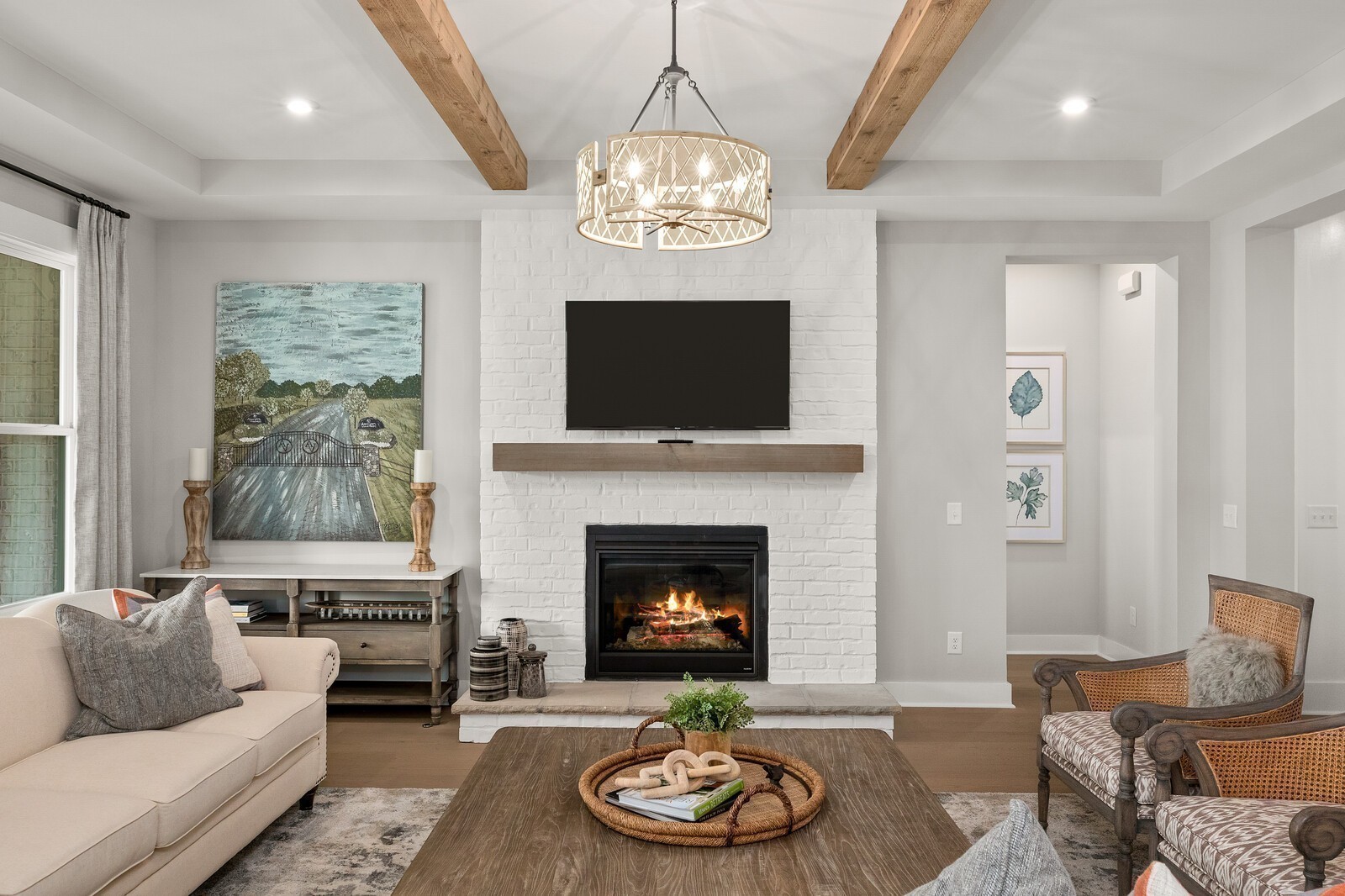 7272 Ruzek Court Fairview, TN 37062 - Photo 12 of 59 a living room with furniture a fireplace and a flat screen tv