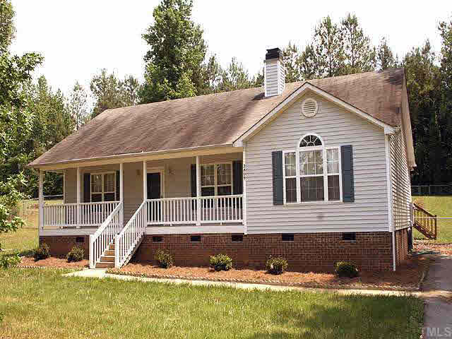 2809 Girth Lane Raleigh, NC 27603 - Photo 2 of 10 a front view of a house with a yard
