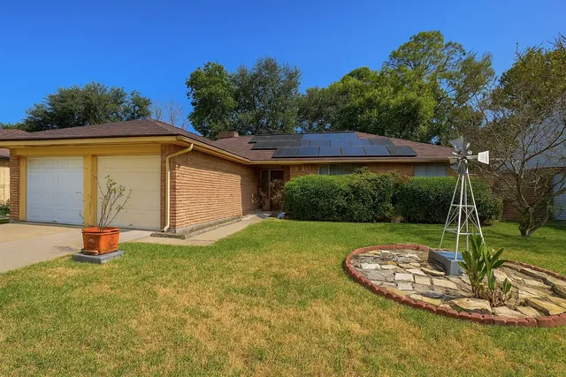a view of a backyard with a garden
