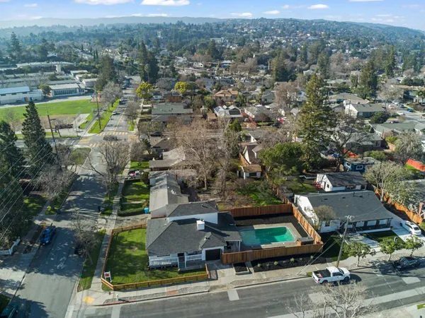 an aerial view of residential building with outdoor space