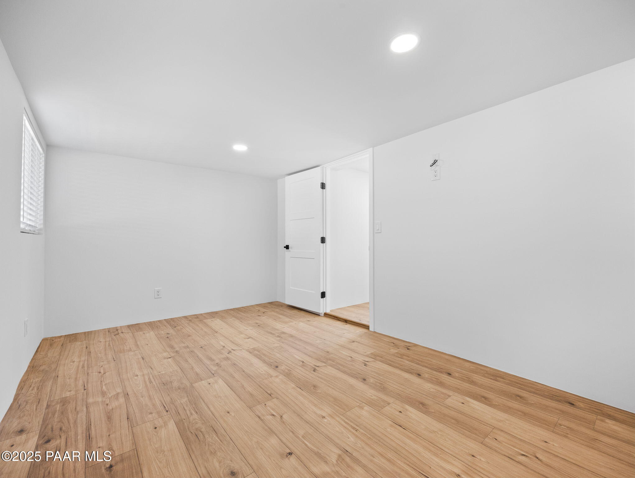 22490 Luna Way Yarnell, AZ 85362 - Photo 20 of 39 a view of an empty room with wooden floor