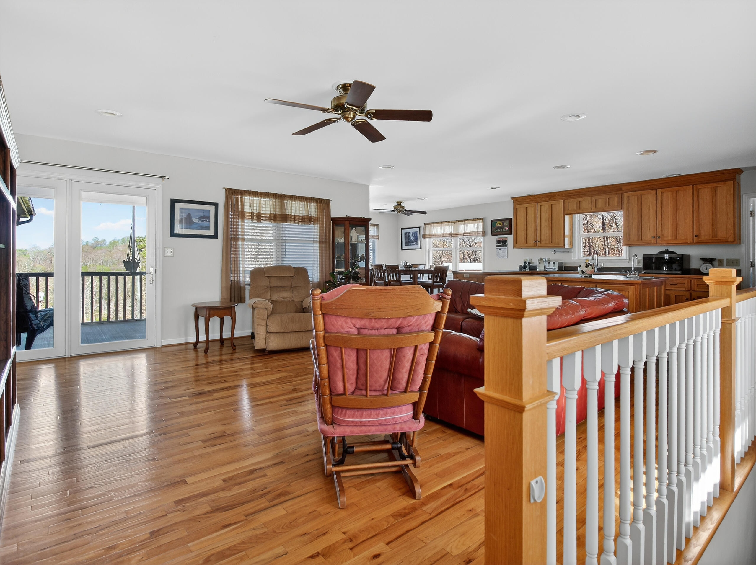 498 Meeks Road Penhook, VA 24137 - Photo 6 of 74 a living room with furniture and a wooden floor
