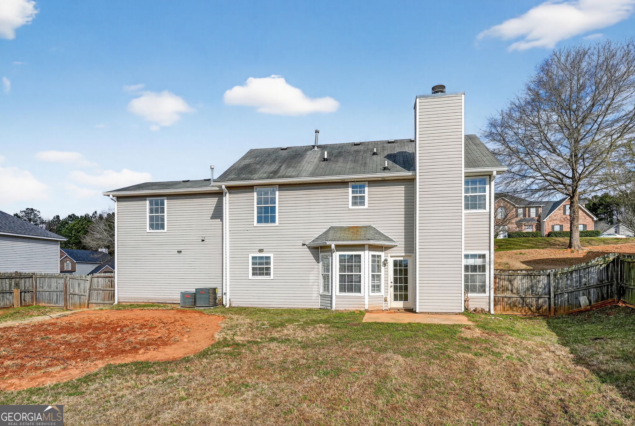 4627 Laura Place Lithonia, GA 30038 - Photo 29 of 33 a front view of a house with a yard