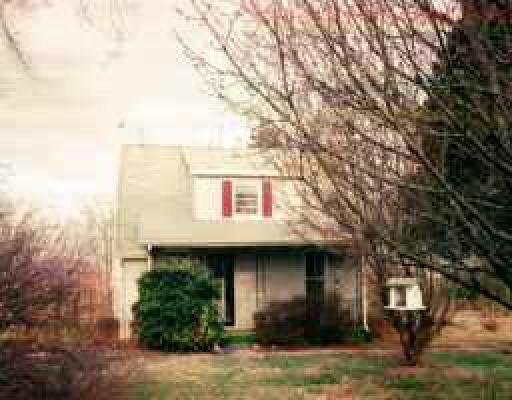 2927 Morgans Mill Road Goodview, VA 24095 - Photo 1 of 1 a front view of a house with garden