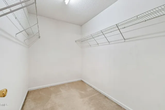 a view of a room with racks on the wall