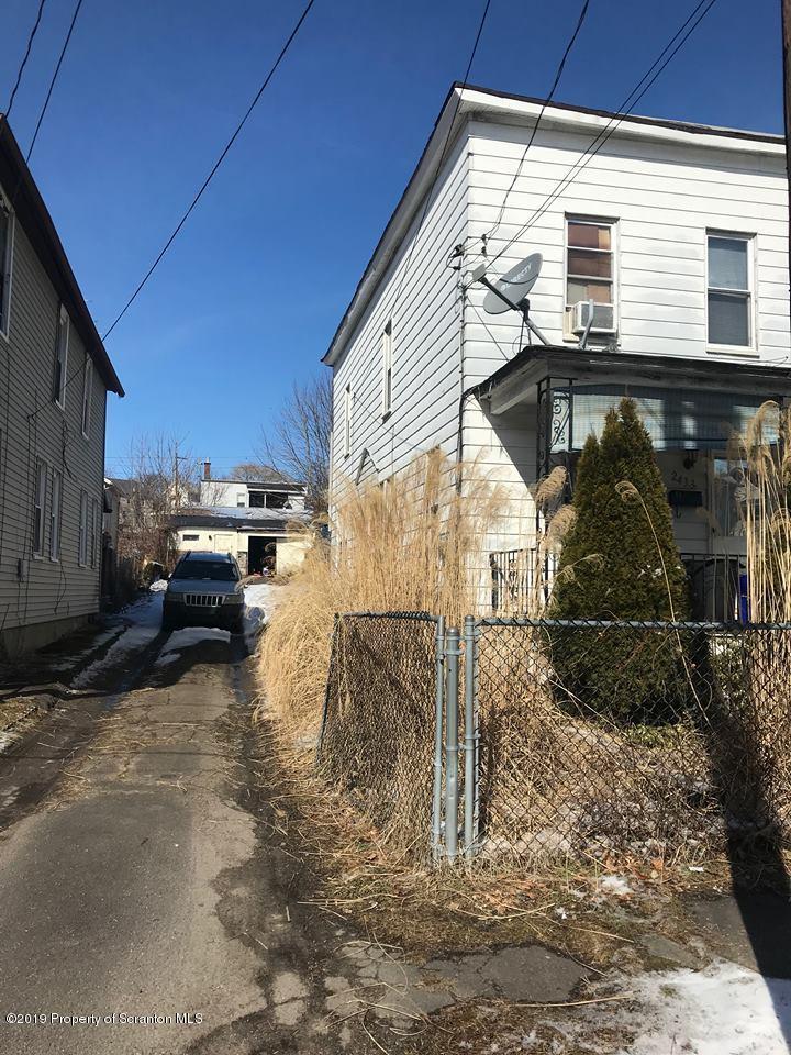2435 Heerman Avenue Scranton, PA 18509 - Photo 2 of 6 a view of a car park in front of house