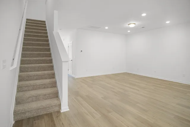 a view of a hallway with staircase