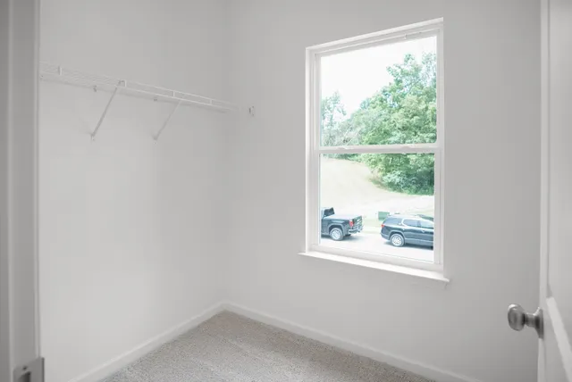an empty room with windows