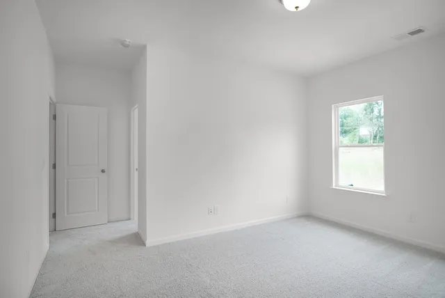a bathroom with a sink vanity and a mirror
