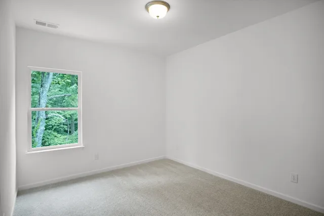an empty room with a window