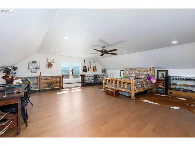 a living room with lots of furniture and a flat screen tv