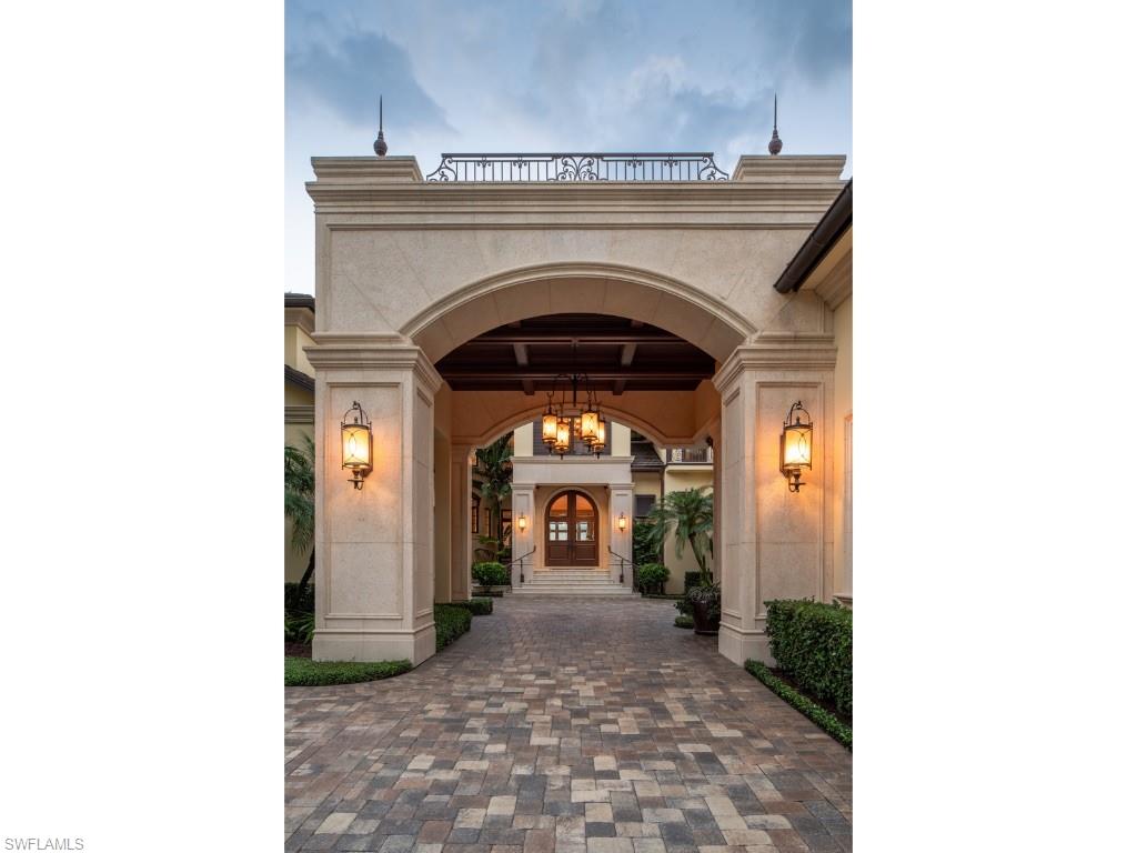 980 Aqua Circle Naples, FL 34102 - Photo 17 of 19 a view of entryway with a garden