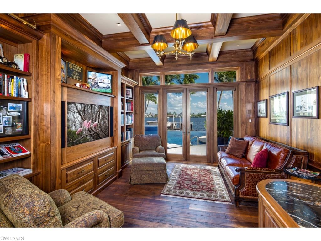 980 Aqua Circle Naples, FL 34102 - Photo 6 of 19 a living room with furniture rug and window