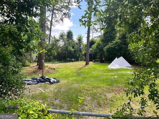 a swimming pool with a yard