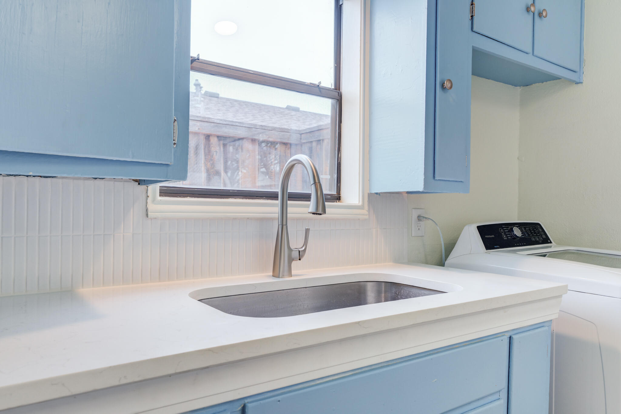 3318 36th Street Lubbock, TX 79413 - Photo 11 of 22 a close view of sink and tap