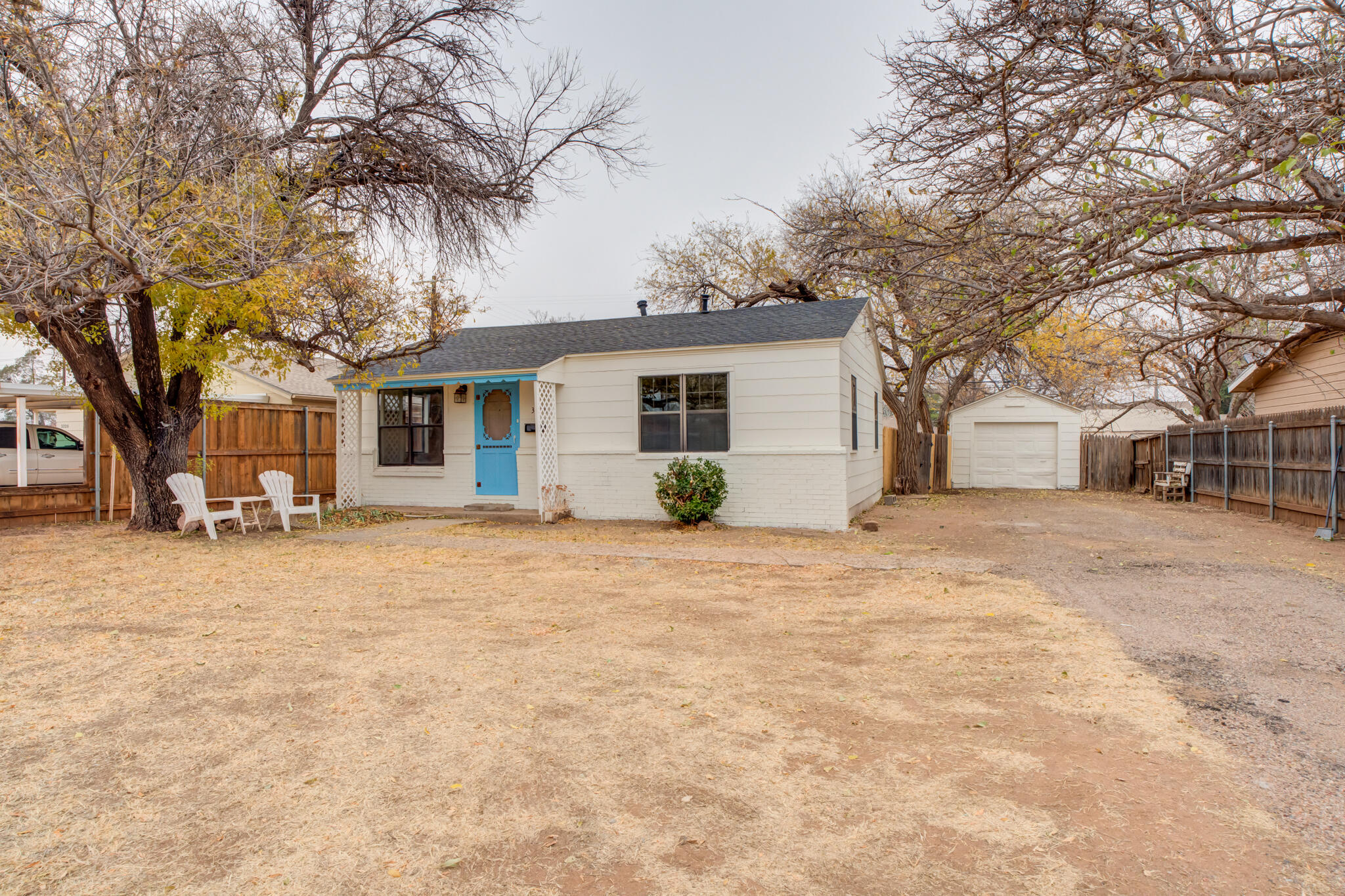 3318 36th Street Lubbock, TX 79413 - Photo 2 of 22 a front view of house with yard and trees