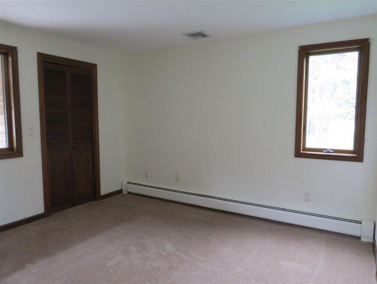 3 Arrowhead Farm Road Truro, MA 02666 - Photo 13 of 35 an empty room with a window