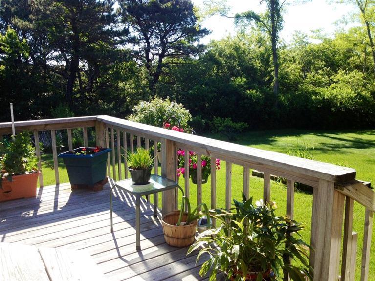 3 Arrowhead Farm Road Truro, MA 02666 - Photo 21 of 35 a view of a wooden deck with chairs