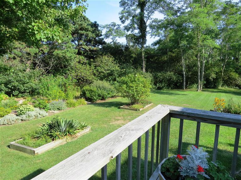 3 Arrowhead Farm Road Truro, MA 02666 - Photo 22 of 35 a view of a garden and deck