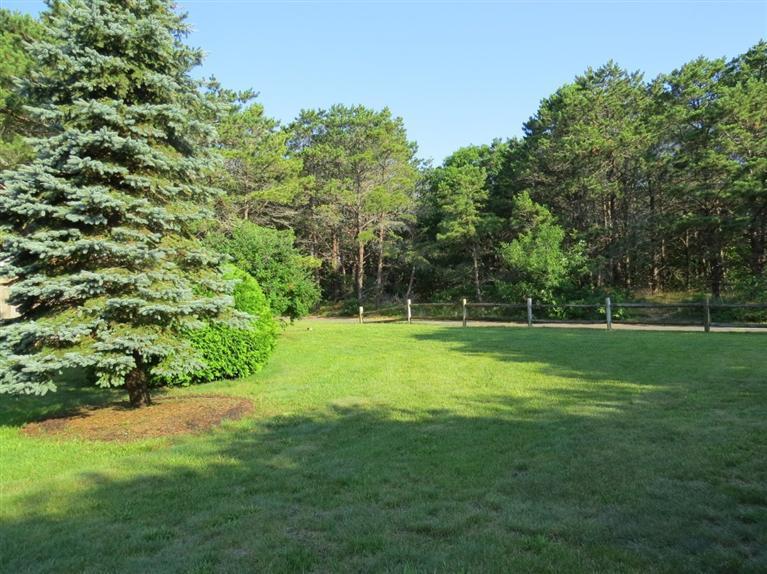 3 Arrowhead Farm Road Truro, MA 02666 - Photo 26 of 35 a view of a grassy field with trees