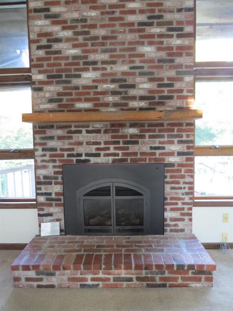 3 Arrowhead Farm Road Truro, MA 02666 - Photo 3 of 35 a view of fireplace and window