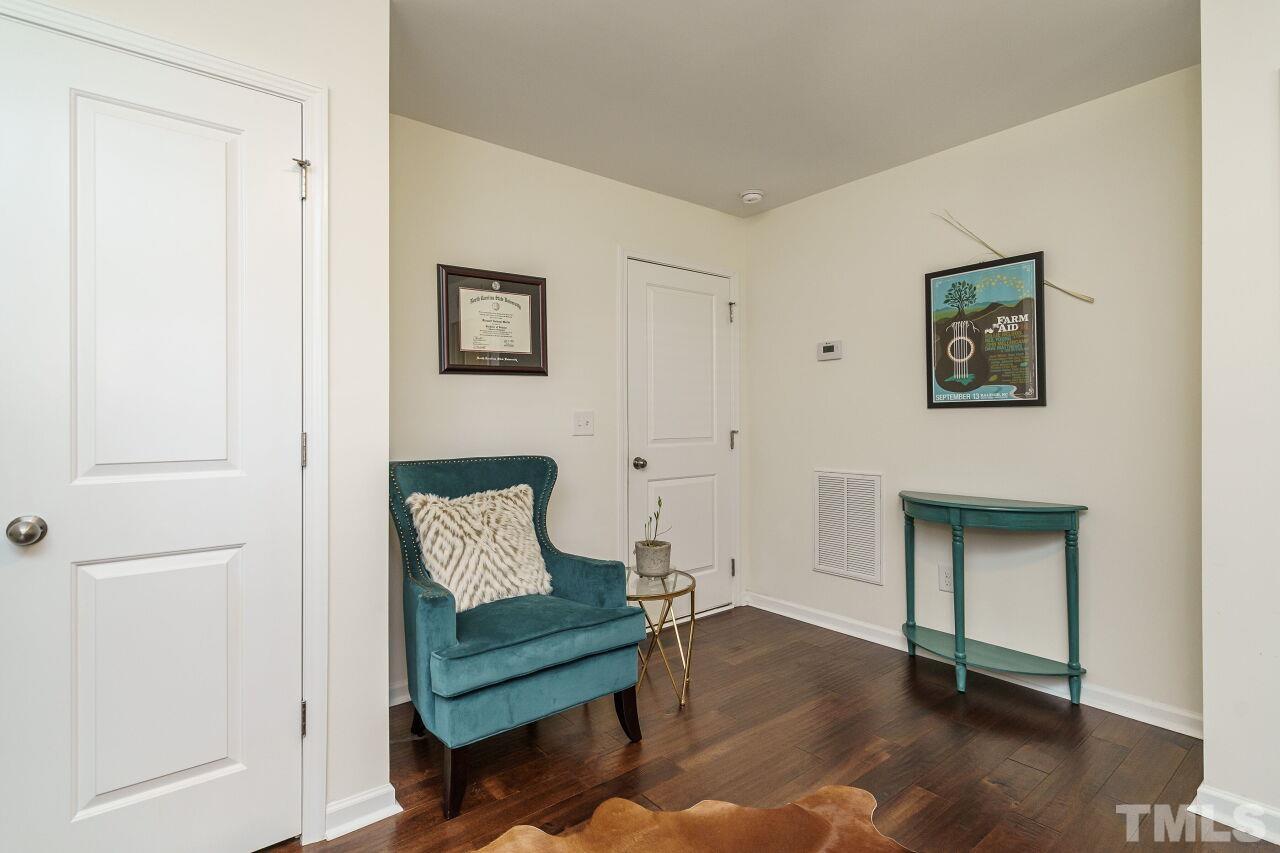 1533 Crafton Way Raleigh, NC 27607 - Photo 24 of 28 a bedroom with a bed and a window
