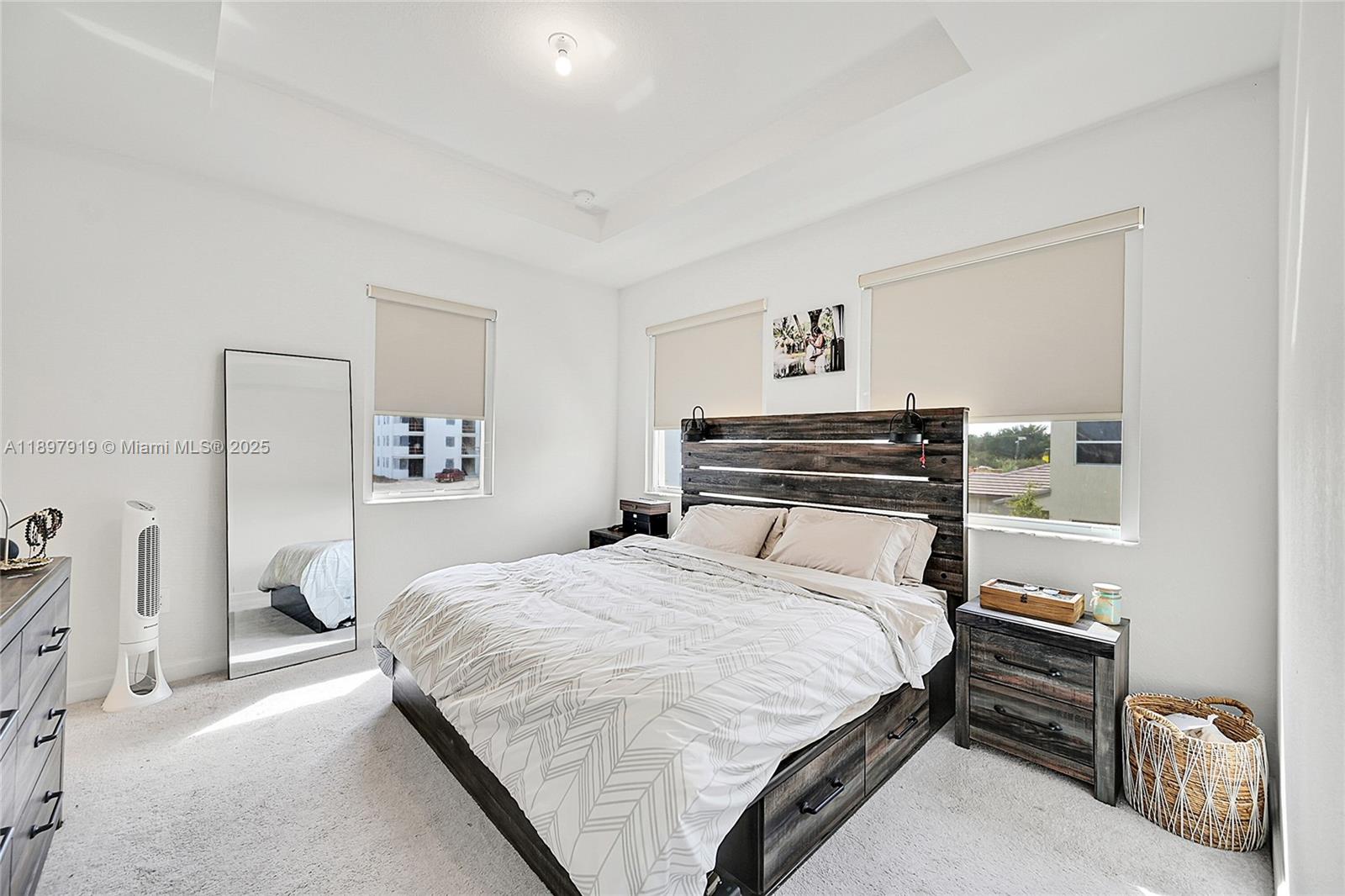 14832 Southwest 265th Street Homestead, FL 33032 - Photo 20 of 43 a bedroom with a bed and a cabinets