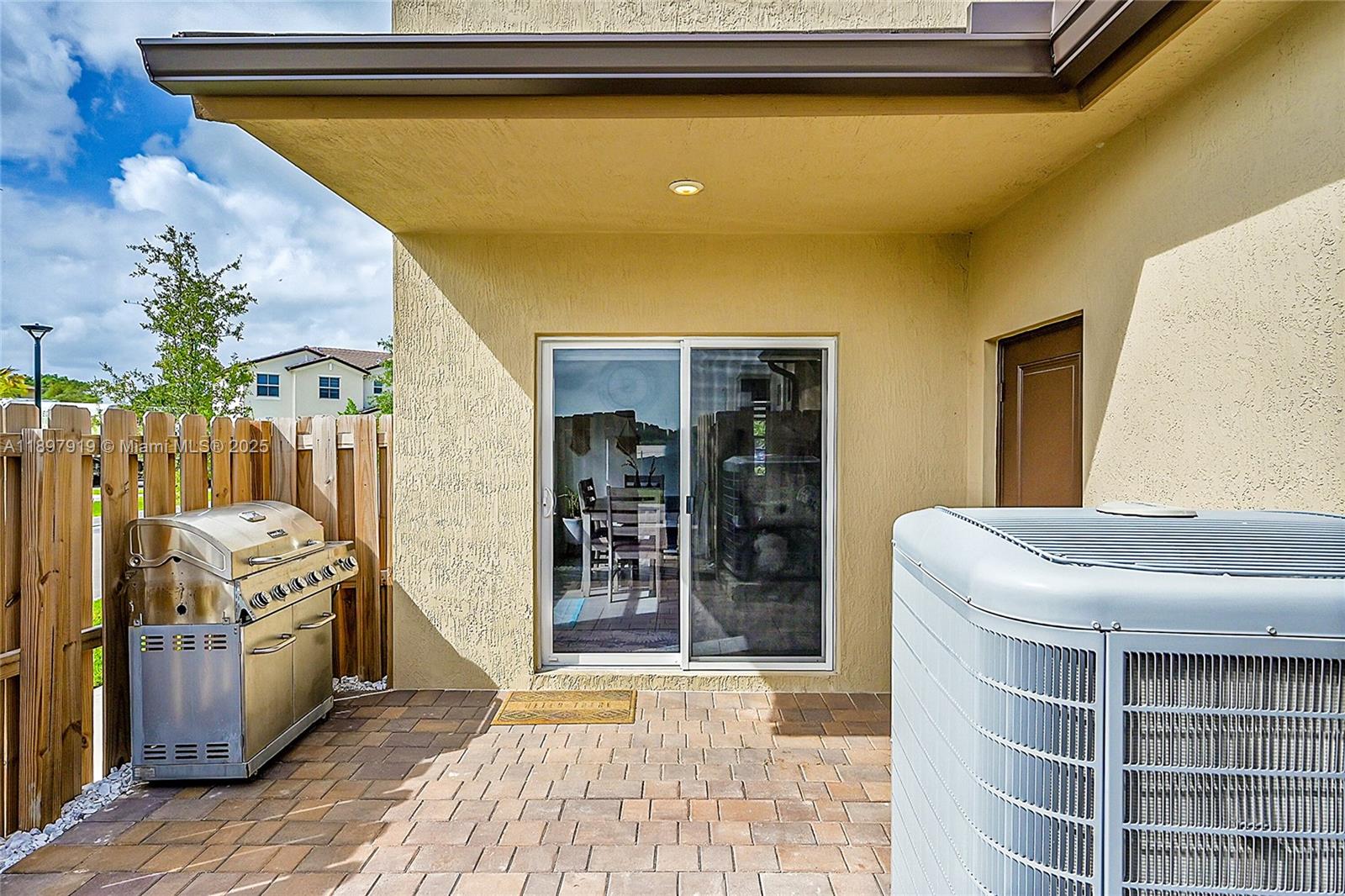14832 Southwest 265th Street Homestead, FL 33032 - Photo 39 of 43 a room with storage and utility