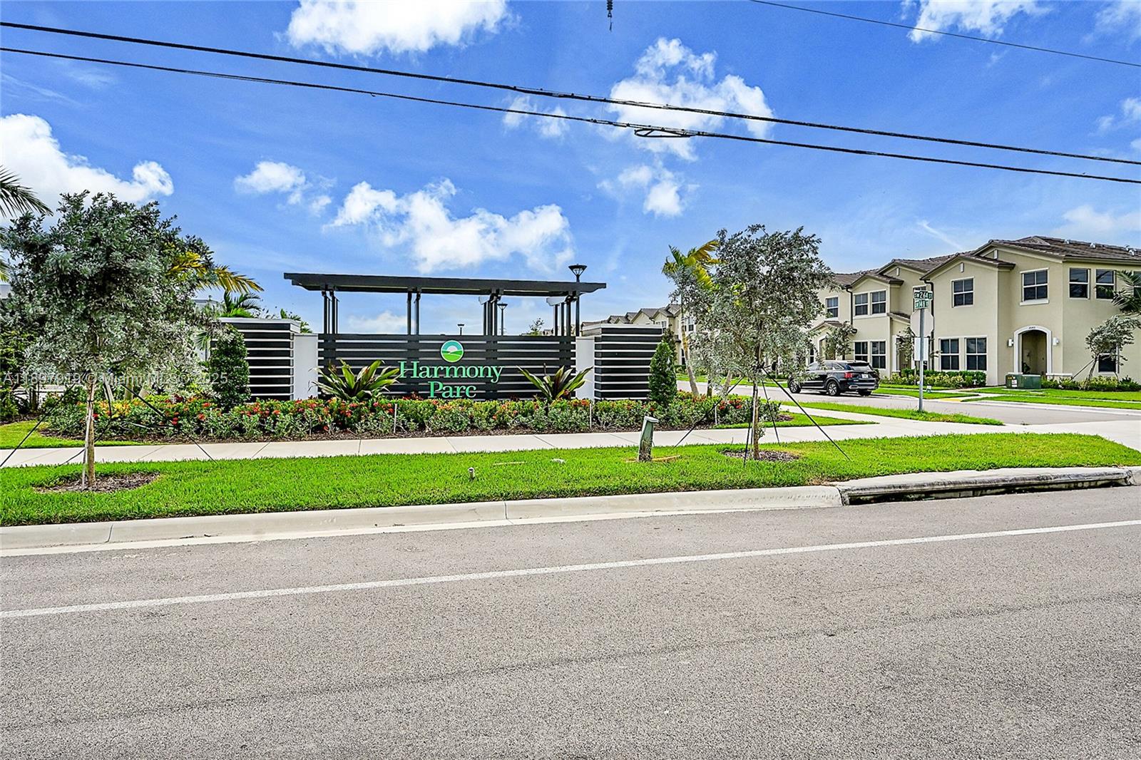 14832 Southwest 265th Street Homestead, FL 33032 - Photo 42 of 43 a view of a house with a big yard and potted plants
