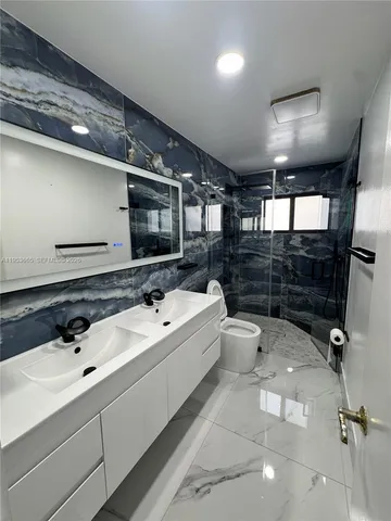 an empty room with closet area