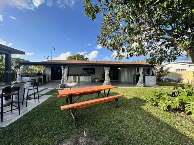 a view of a terrace with couches and a table