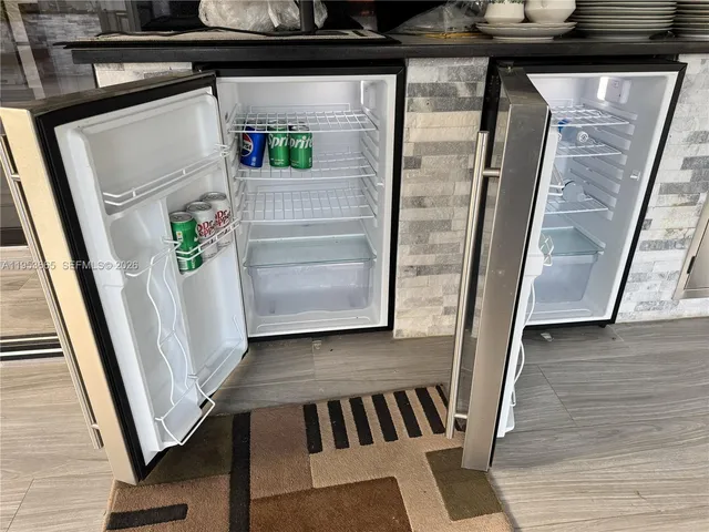 a bathroom with a sink toilet and mirror