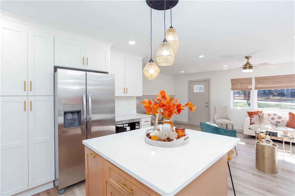 1560 North Columbia Place Decatur, GA 30032 - Photo 15 of 50 a kitchen with a dining table and chairs