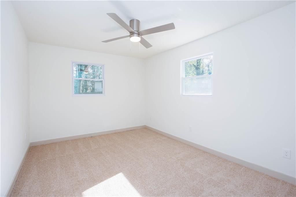 1560 North Columbia Place Decatur, GA 30032 - Photo 28 of 50 an empty room with a window