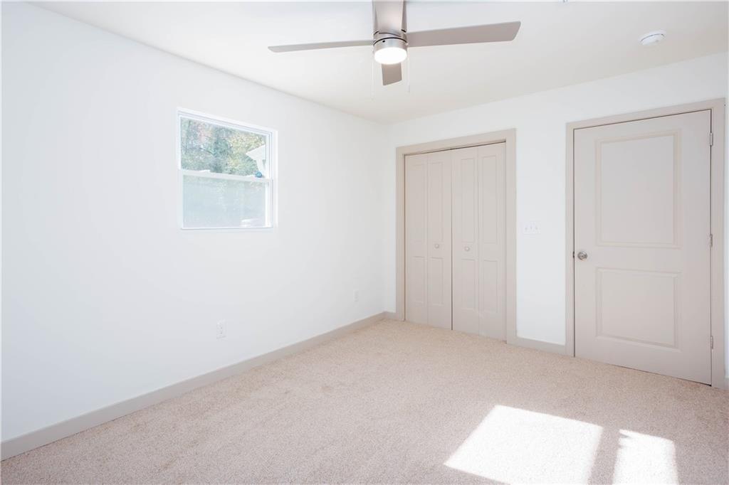 1560 North Columbia Place Decatur, GA 30032 - Photo 29 of 50 an empty room with a window