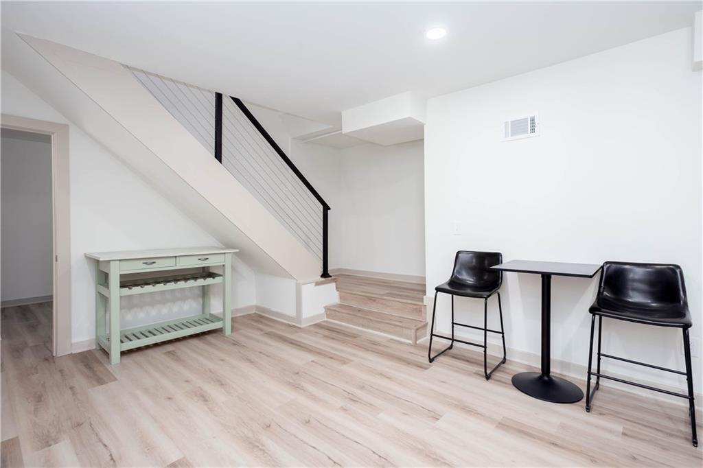 1560 North Columbia Place Decatur, GA 30032 - Photo 40 of 50 a view of entryway and hall with wooden floor